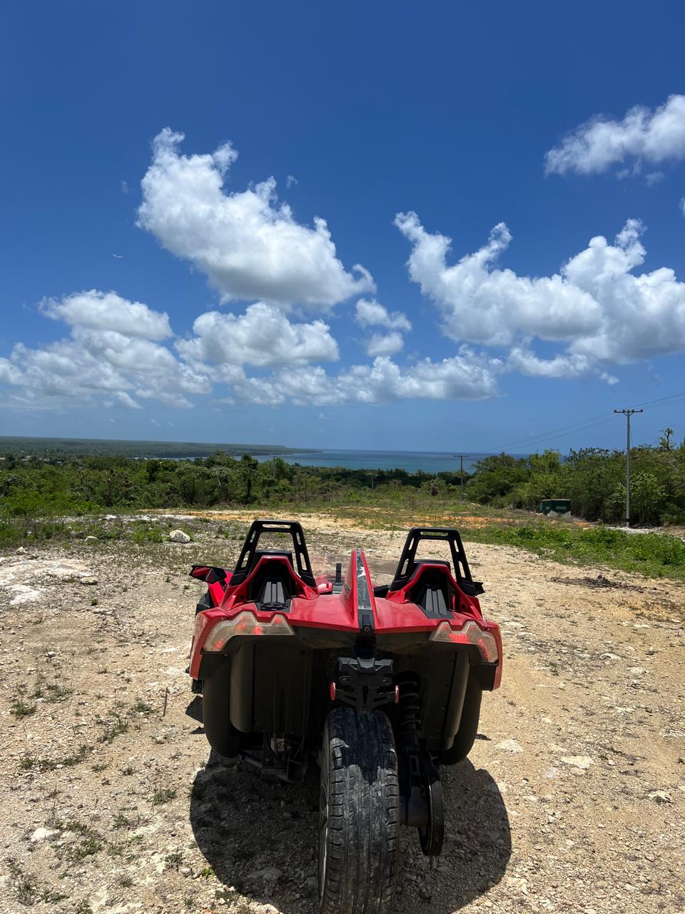 “Tourists driving slingshot at Yuma scenic viewpoint in Yuma Hights”